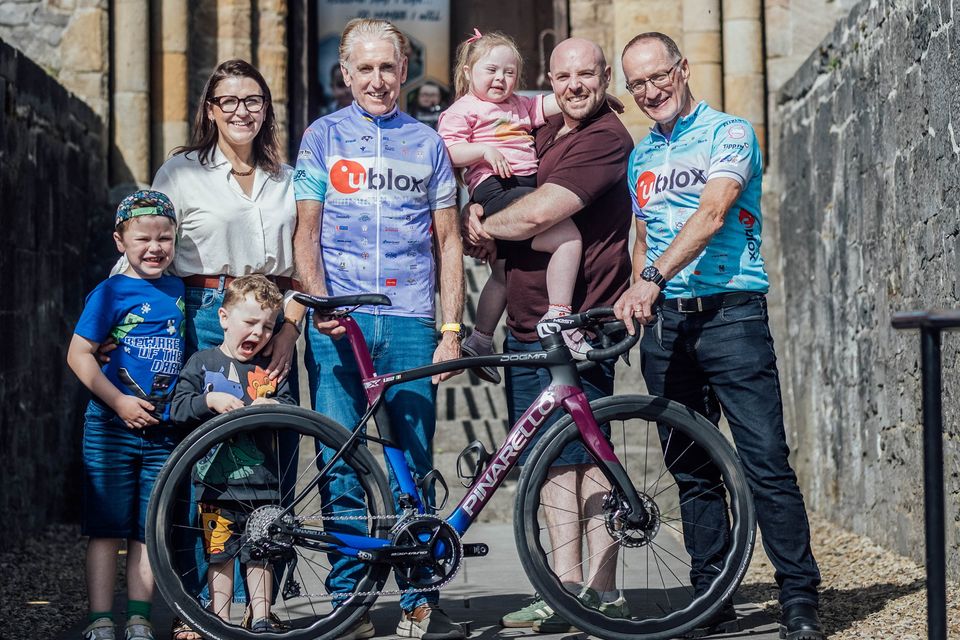 Annabelle Doogue, Eoin Doogue, Ollie Doogue, Louise Doogue, Ian Doogue pictured with Paul Sheridan, founder and organiser of Tour de Munster, and cycling legend Sean Kelly at the oﬃcial launch of the 25th annual Tour de Munster, in aid of Down Syndrome Ireland (DSI) Munster branches. Photo: Brian Arthur